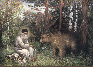 st seraphim of sarov with a bear from nativityofchristnet